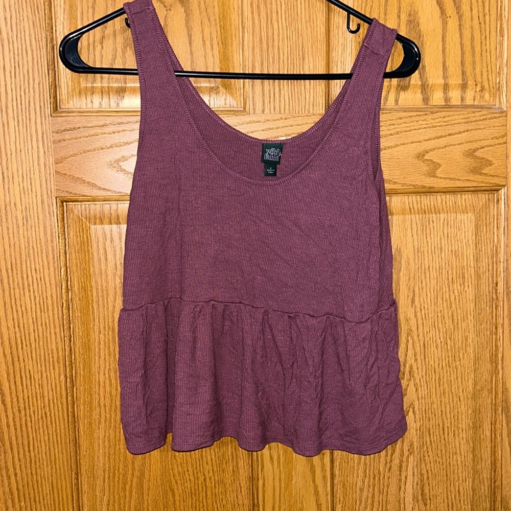 Maroon tank top size s. Gently worn. No stains or tears.